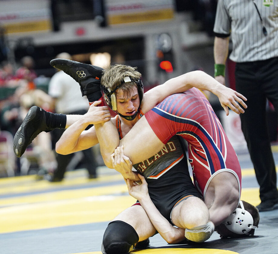 Howland’s Heckman rallies into quarterfinals Fellow Tiger Mock earns